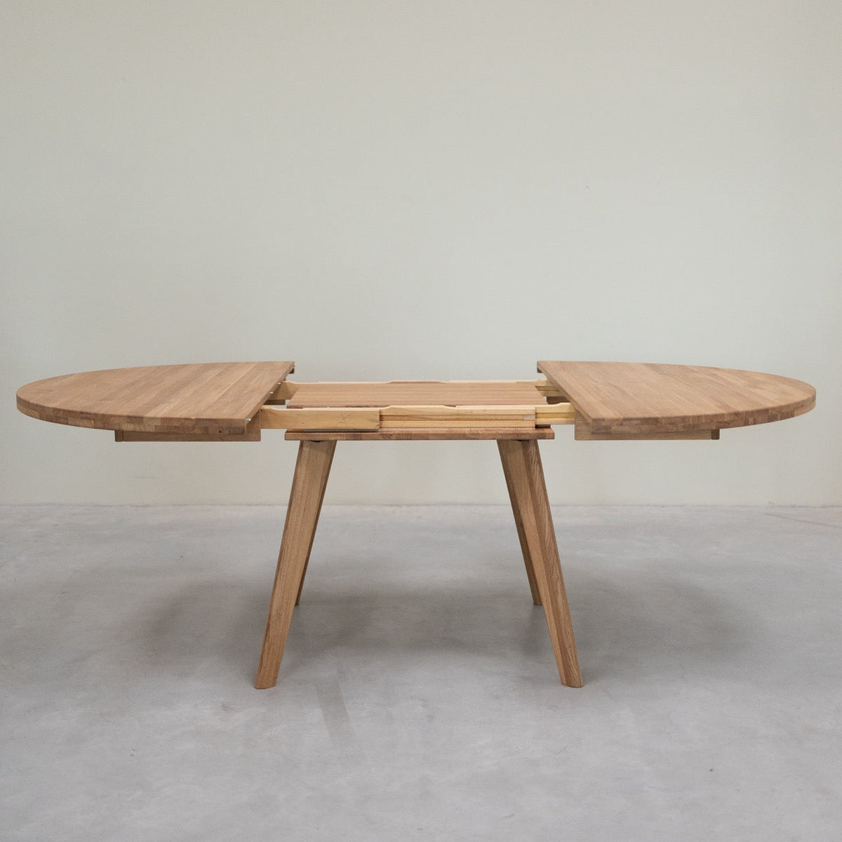 Table de salle à manger ronde à rallonge en chêne massif LEA | VESKOR